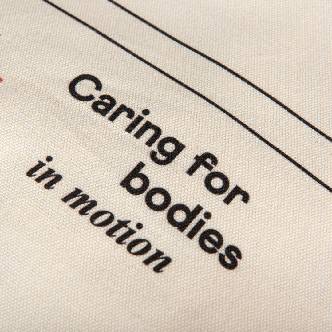 Text 'Caring for bodies in motion' on a fabric background